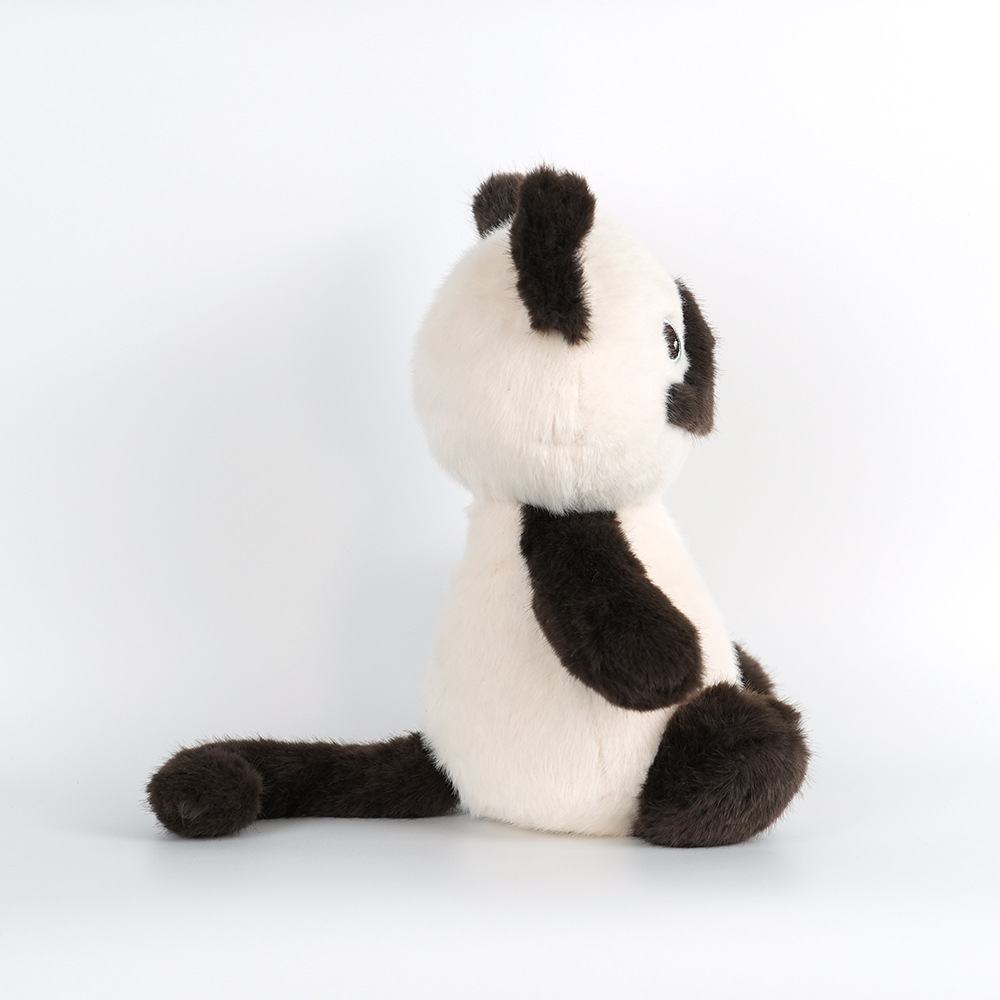 détail de la fourrure et des matériaux de la peluche raton laveur CatDoll™